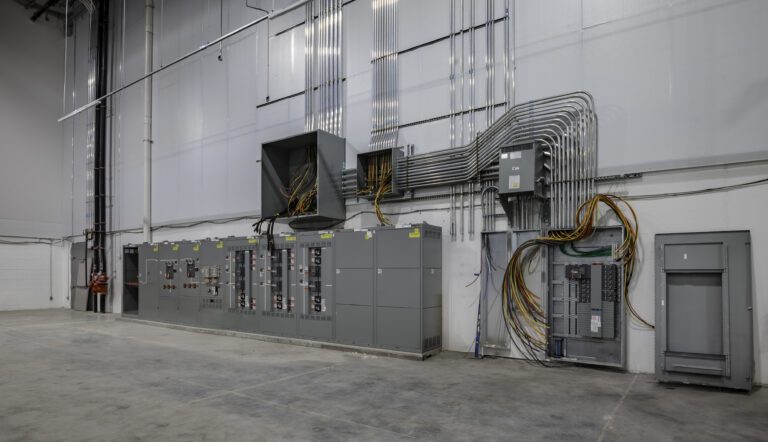 Switchboard lineup and panelboard fed by aluminum EMT conduit at Amazon SNJ5, Jersey City NJ